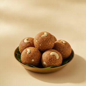 Millet ghee laddus in a brass bowl